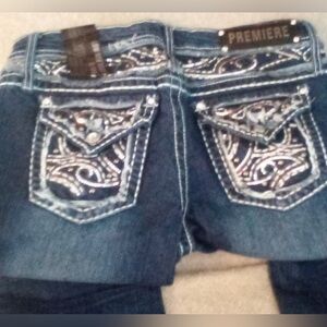 PREMIERE DENIM BY RUE21 low rise boot cut 9/10 REG.
NWOT